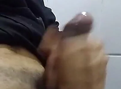Young Man in the Public Bathroom