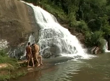 Three Nude in the River