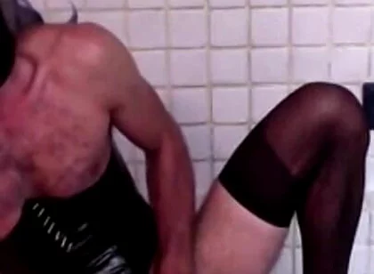 Latex Masked Sissy in Pvc Corset Cums Hard on Stockings and Heels