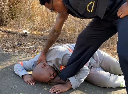 Vigilante Humiliating the Worker