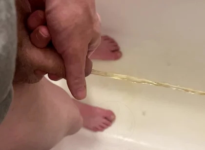 Amateur Boy Pissing, with Close-up and Good Quality Slow Motion of the Load of Pee Coming Out of the Pee-hole (urethra)