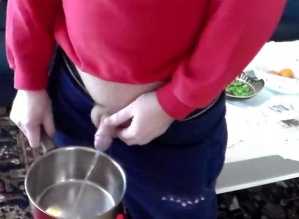 John Is Pissing Into a Kitchenpot