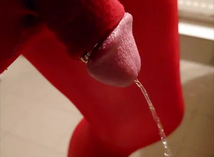 Pissing at Home in Red Legging with Penis Sleeve
