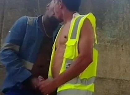 Two Workers Behind the Service Wall