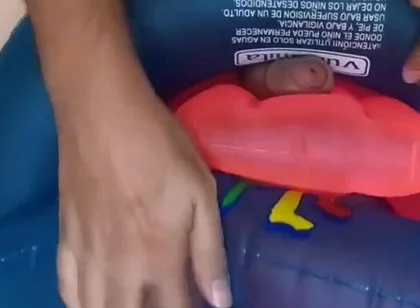 Playing with inflatable swim ring