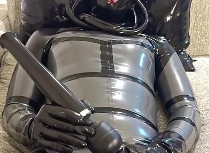 Latex Alien Enjoying with the Vibrator