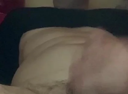 Masturbating
