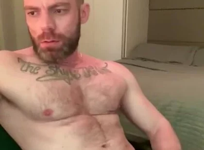 Masturbating