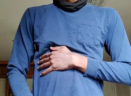 Masturbating