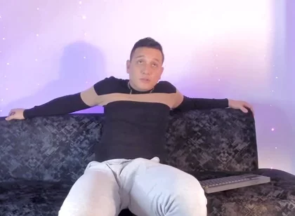 Latino Shows off His Bump on Camera Inside His Gray Sweatshirt