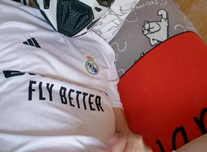 The Guy Is Wearing a Soccer Uniform and Mxhelmet with a Morning Cum