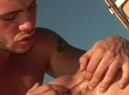 Two sea men fill each other with semen while out on the yacht