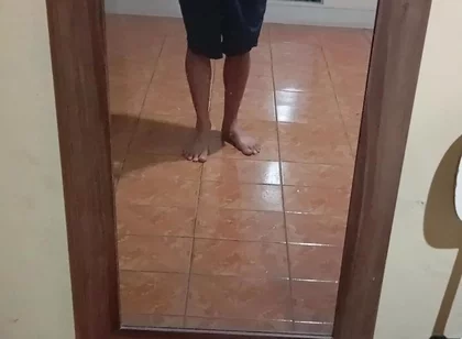 Boy in Shorts in the Mirror
