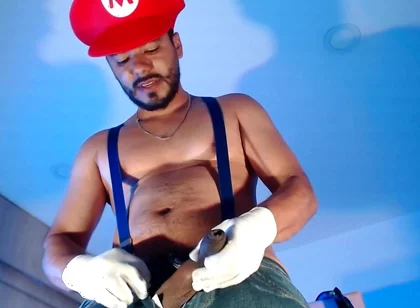 Dressed as Mario Bros Playing with His Plumbing Tool