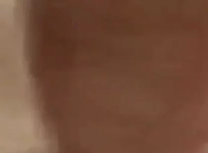Masturbating