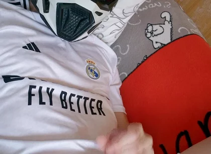 The Guy Is Wearing a Soccer Uniform and Mxhelmet with a Morning Cum