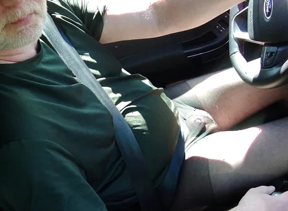 Nylonjunge Driving Car in Black Pantyhose
