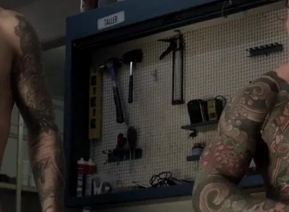Two Friends in the Mechanic's Workshop