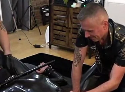 Rubber Gimp Bound and Used by Two Latex Guys Part 1