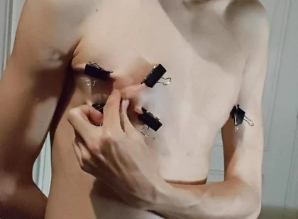 Twink Playing with Binder Clips