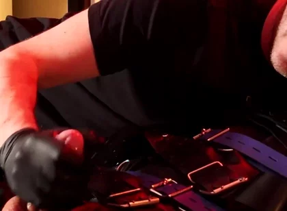 Edging the Boy in Leather Bondage but He Is Not Allowed to Orgasm