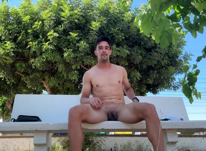 Hot Stud Fully Naked on Public Park Bench Gets Caught