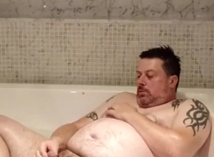 In the Big Bath Having a Wank