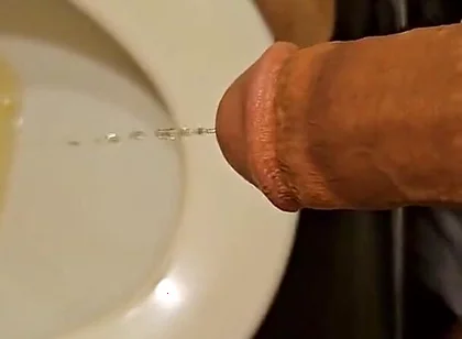 Shaved Cock Pissing