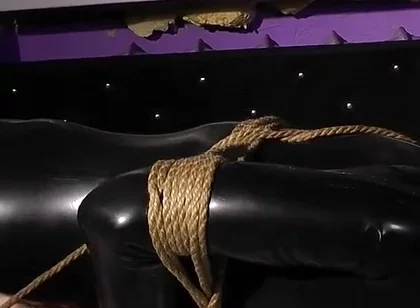 Roped in Latex: Zeus Struggles to Break Free