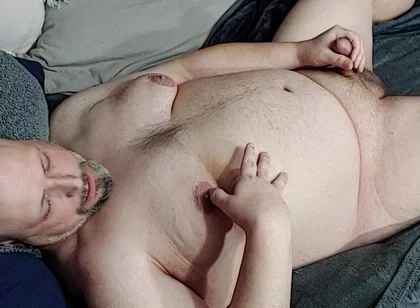 Chubby Guy Takes off Blanket and Cums