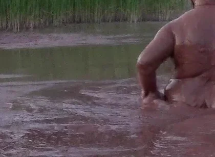 Mud Bath in Deep Quarry Mud Pond