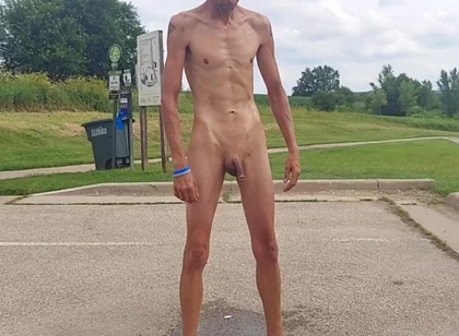 Naked and Pissing in Parking Lot