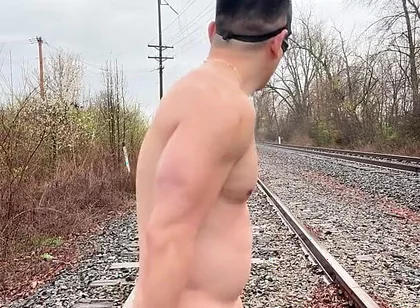 Rain-soaked Asian Muscle God in Jockstrap Bounces Pecs, Shows V-taper & Eats His Massive Load on Train Tracks