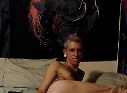 Smooth Tattooed Twink Plays With Dildo