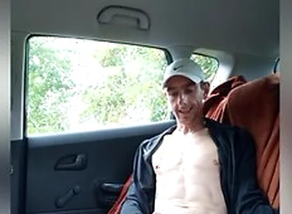 Boy Is Having A Great Time In The Back Seat Of The Car