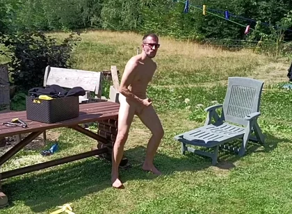 Jerking off While Hanging Out the Laundry