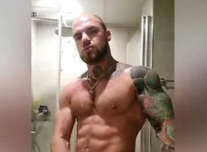 Bold Tattooed Jock Flexing In Bathroom And Jerking Massive Cock