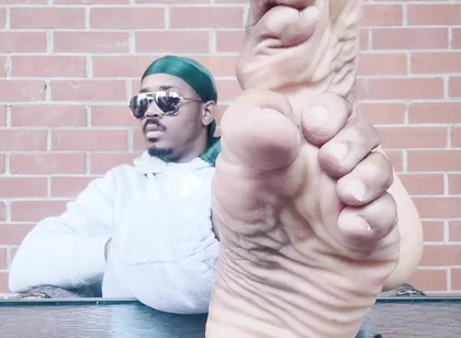 I Expose My Feet and I Touch Them
