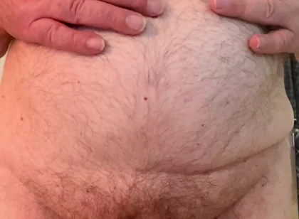 Coach Karl Rubs His Belly 6811
