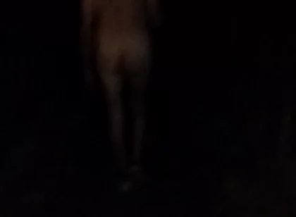 Naked Walking on the Hill Along Highway