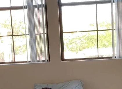 Watching Him Drift Between Shirts and Shorts