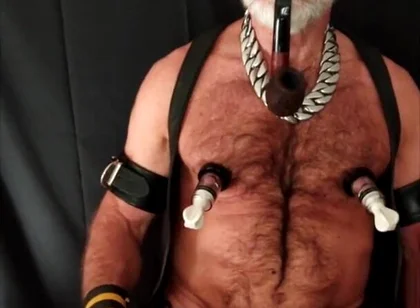 Stepdad Playing with Strap-on While Smoking His Pipe