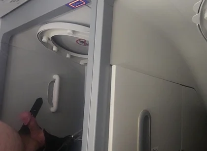 Airplane Bathroom Jerk and Cum.