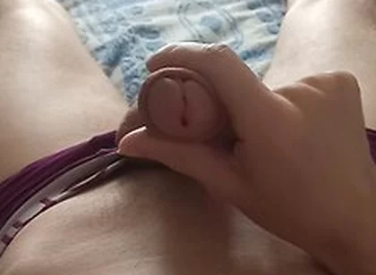 A Guy In Purple Panties Jerks Off His Dick And Moans With Pleasure