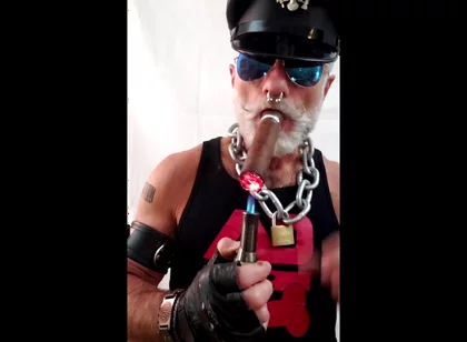 Leather Stepdad Lighting a Big Ring