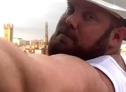 Builder Iron Bending Muscle Flexing and Measuring