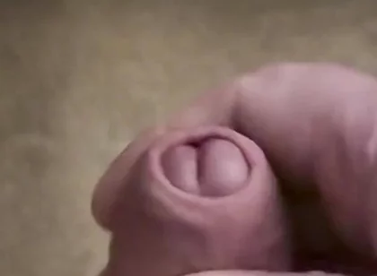 My Friend Sits in a Chair and Jerks off His Cock While Watching Video