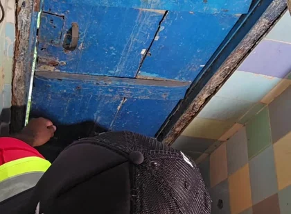Two Construction Workers Making Out in the Company Bathroom.