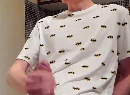 Sweet load of cum flows from this cute guy's big cock