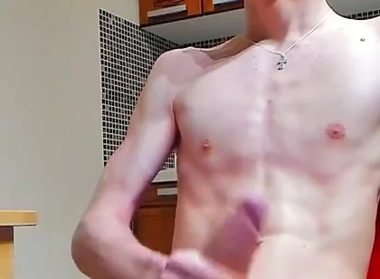 A young beautiful gay twink fucks a vibrator